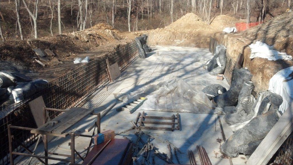 Floor is poured and wall forms are going up