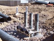 10 19 05 view of siphon installed  piping network before placement of concrete chamber